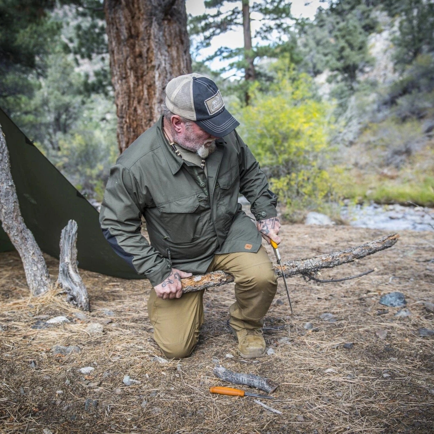 Heavy-duty seam reinforcement on military-grade tarp fabric
