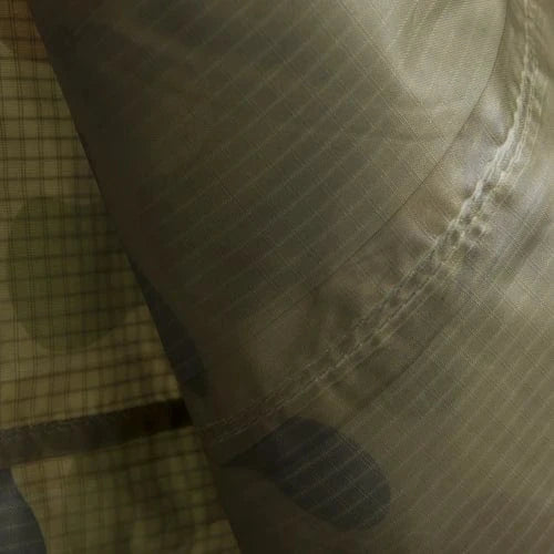 Heavy-duty seam reinforcement on military-grade tarp fabric

